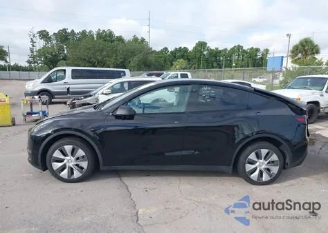 2023 Tesla Model Y Awd/Long Range Dual Motor All-Wheel Drive z USA, uszkodzony, nr VIN 7SAYGDEE2PA044328